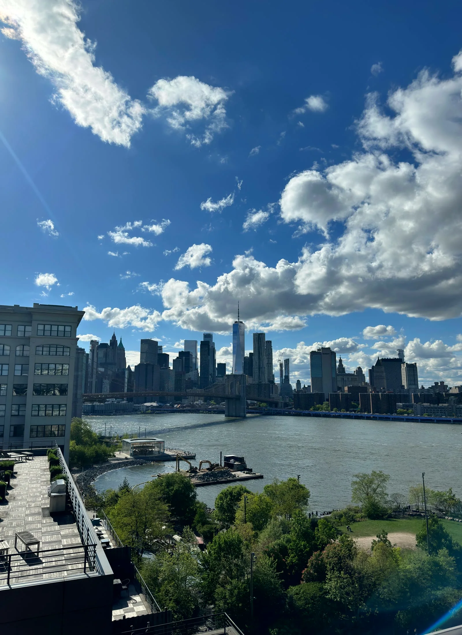 Brooklyn Bridge, One World Trade Center, and downtown New York City